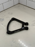 DevMoto E-Moto suspension triangle component for electric motorcycles, showcasing the durable metal part with mounting points.