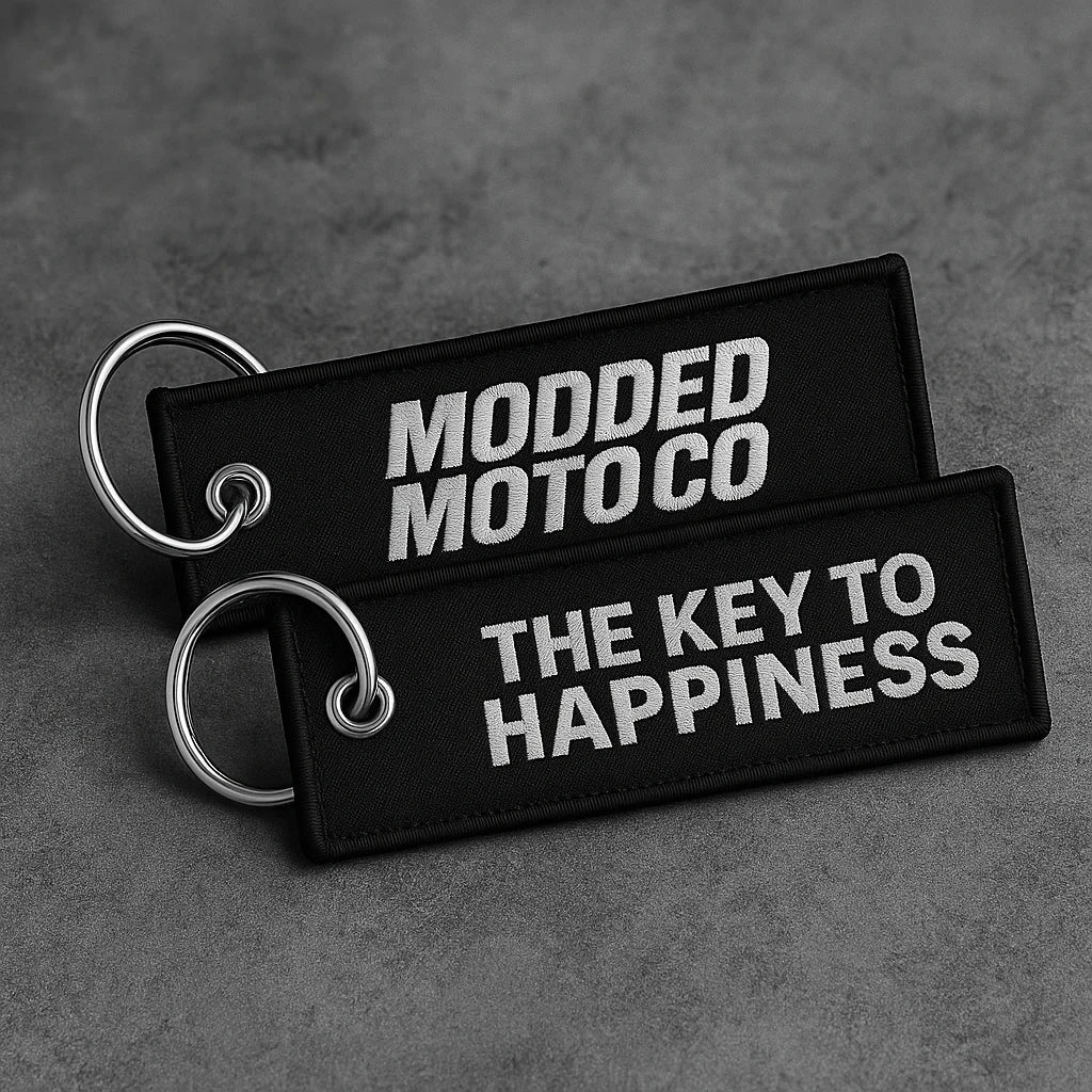 Modded Moto Co MMC Accessories Pack with various motorcycle accessories arranged on a clean background
