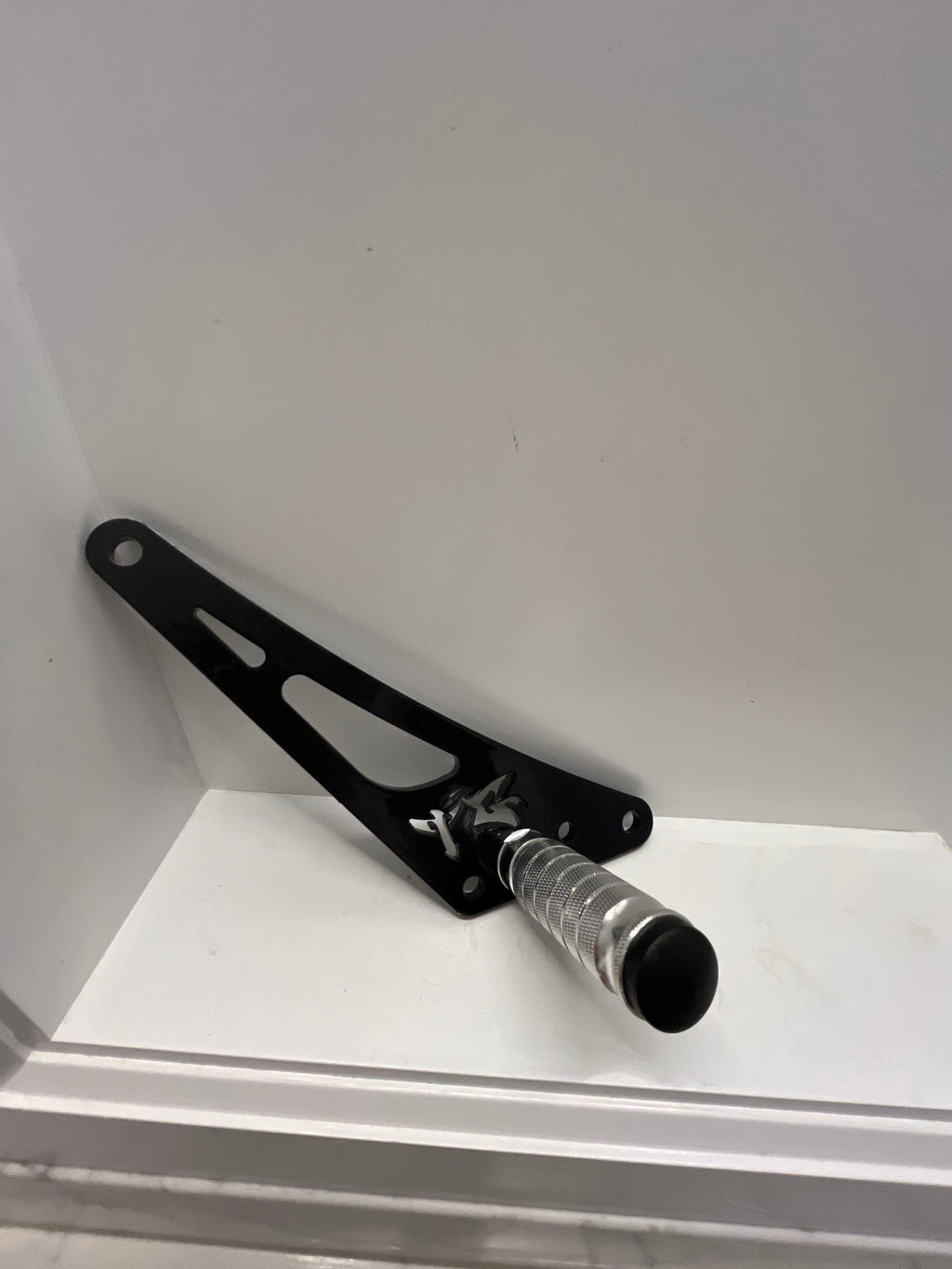 TG Racing Ultra Bee Shift Lock, a durable automotive shift lock mechanism with metallic finish and branding details.