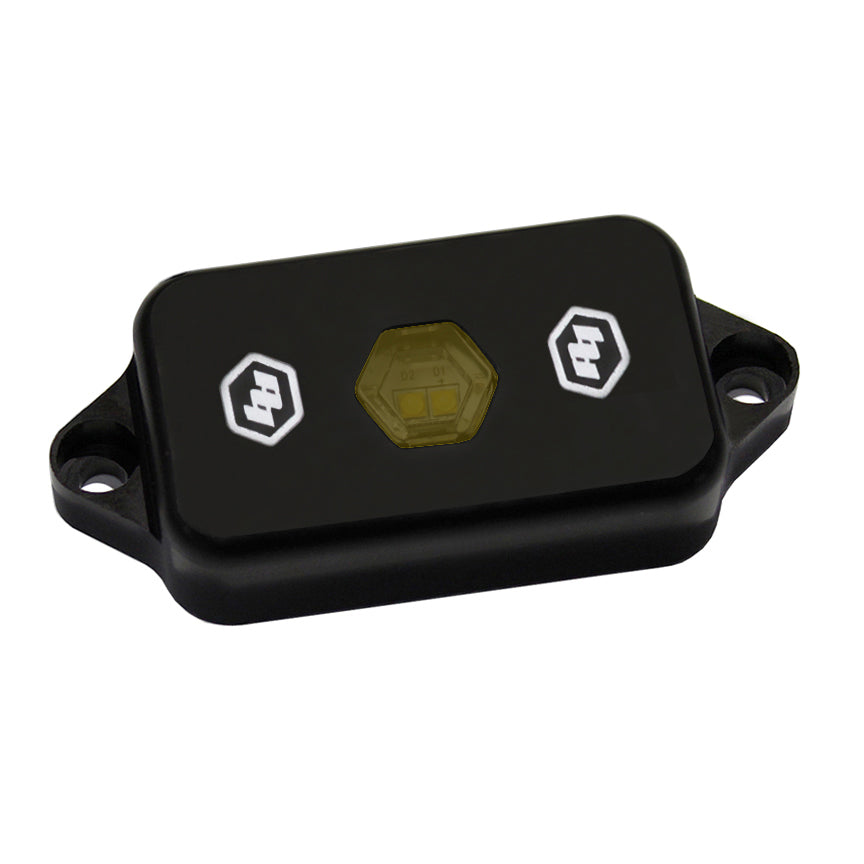Amber LED rock light kit from Baja Designs by Overland Expedition Outfitters, showing multiple LED lights mounted on a rugged vehicle.