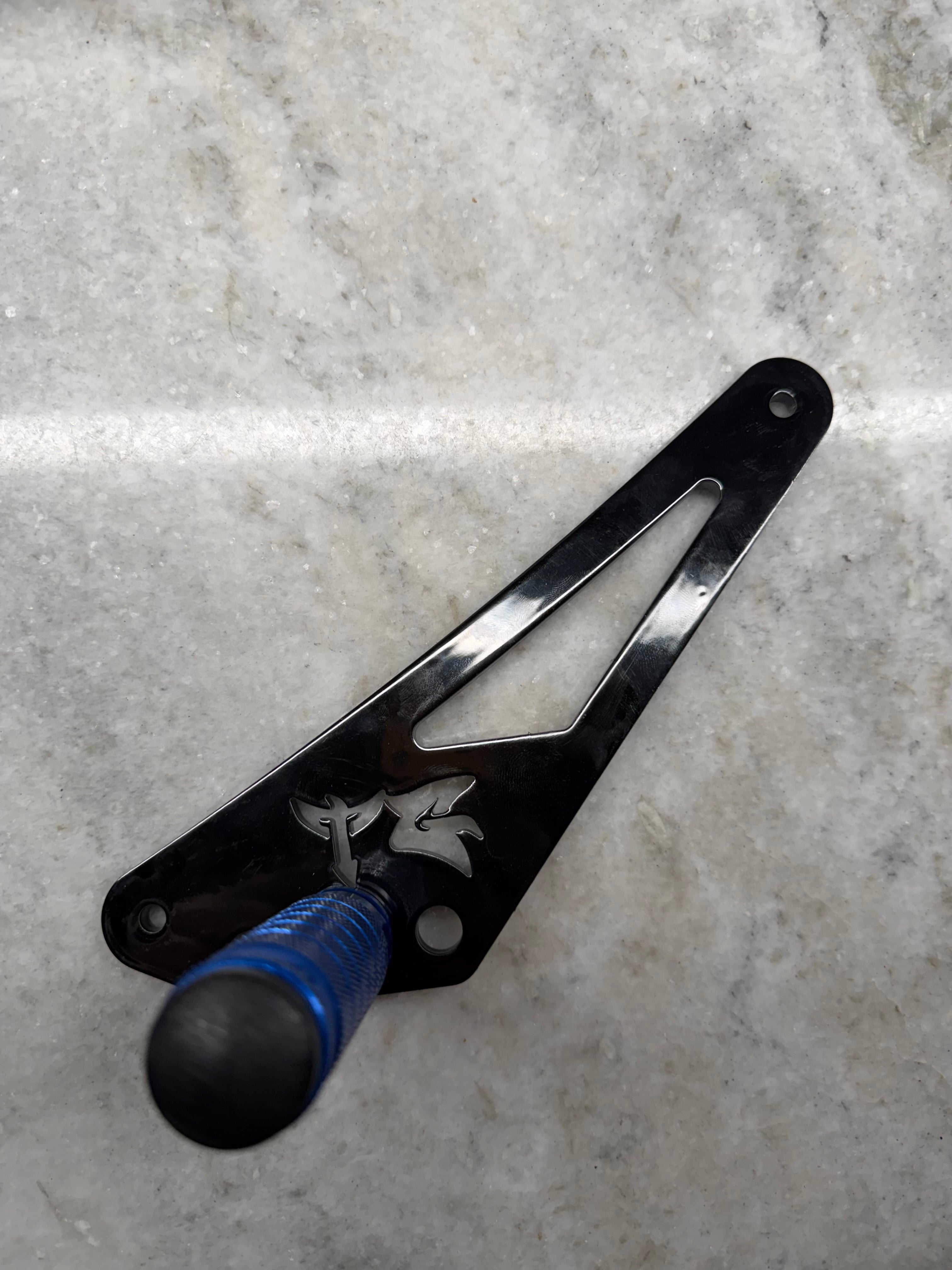 TG Racing 79 Bike Ventus Shift Lock shown in black with metal construction and secure locking mechanism for bike gear shifting.