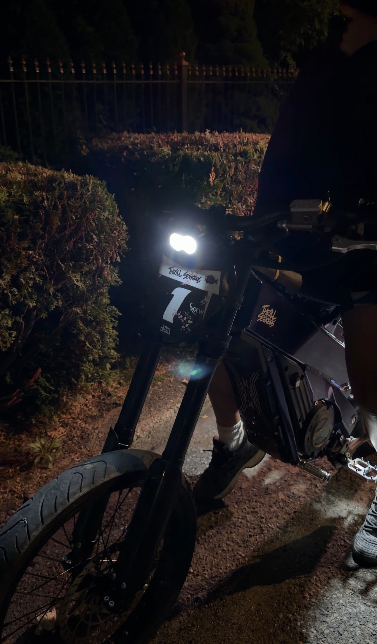 Amp Motion Battery Power Baja with Rocklight, rugged off-road vehicle with robust design and integrated rocklight for enhanced visibility.