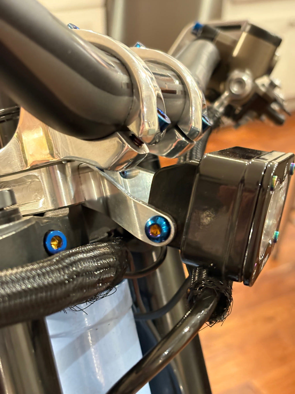 Pair of DevMoto Side Baja Mount Titanium Bolts set, showing sleek, durable fasteners designed for off-road vehicle applications