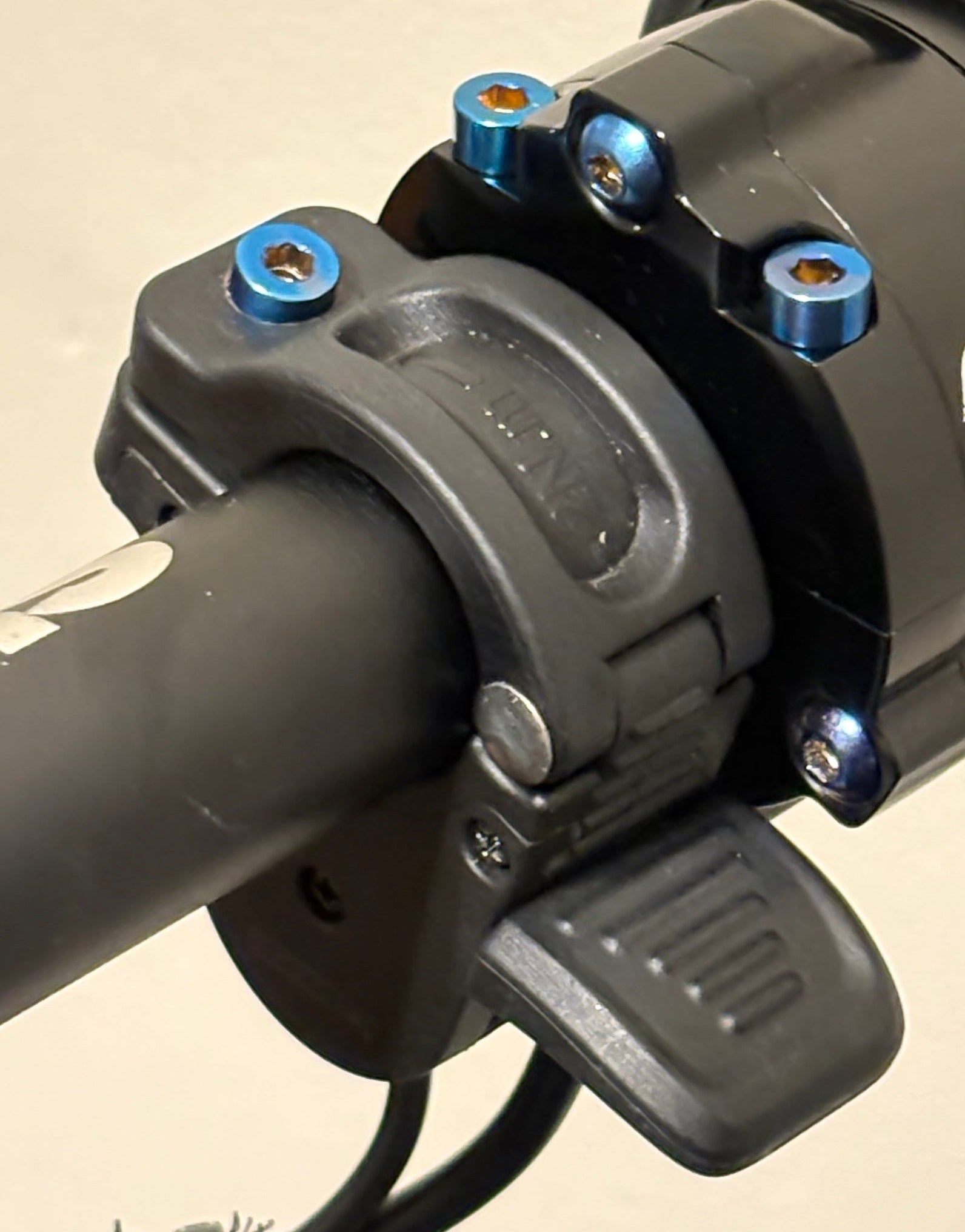 DevMoto Regen Throttle Titanium Bolt set showing a close-up of the lightweight, durable titanium bolt used for motorcycle throttle assembly.