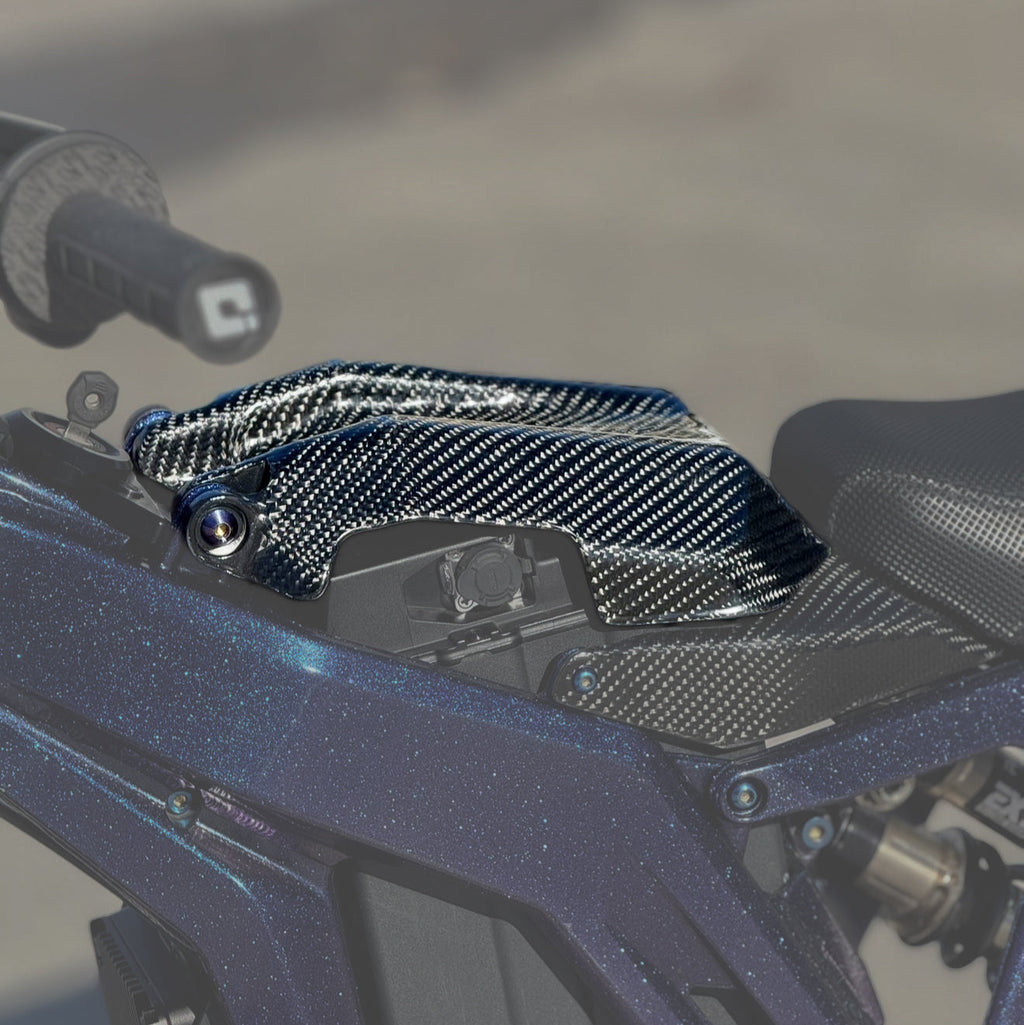 E-Ride Pro Carbon Fiber Battery Lid accessory by Modded Moto Co, showcasing a sleek, lightweight carbon fiber design for e-bike batteries.