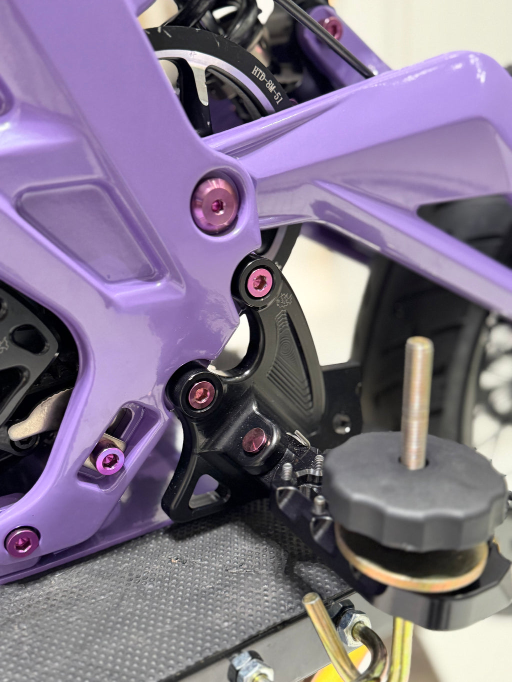 Set of four DevMoto All Emoto Peg Bracket Titanium Bolts with precision threading for motorcycle pegs and accessories.