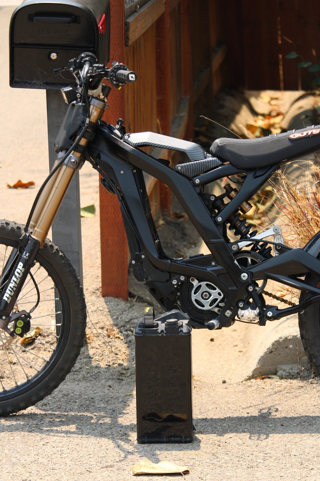 MXwraps Vantablack battery vinyl wrap for e-bike batteries, featuring an invisible, sleek, black protective design.