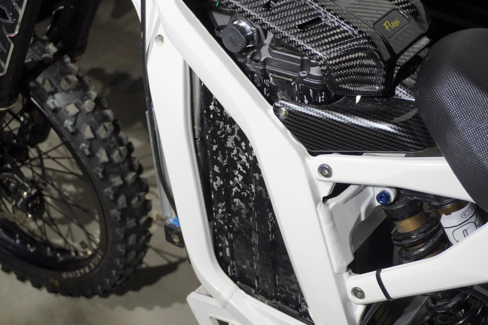Black camouflage vinyl wrap for E-bike battery by MXwraps, showcasing the ShadowSlate design on a smooth battery surface.