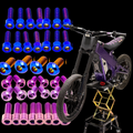 DevMoto Talaria XXX Titanium Bolt Kit showing metallic bolts and hardware on a clean background, designed for high-performance motorcycle use.