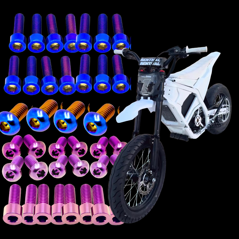 DevMoto Yozma Titanium Bolt Kit with multiple silver titanium bolts arranged for motorcycle repair or customization.