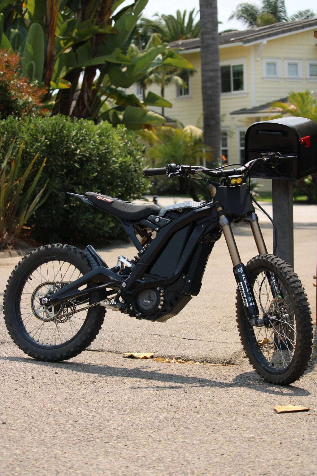 Black Vantablack MXwraps E-bike battery vinyl wrap showing smooth, seamless coverage around the battery of an electric bicycle.