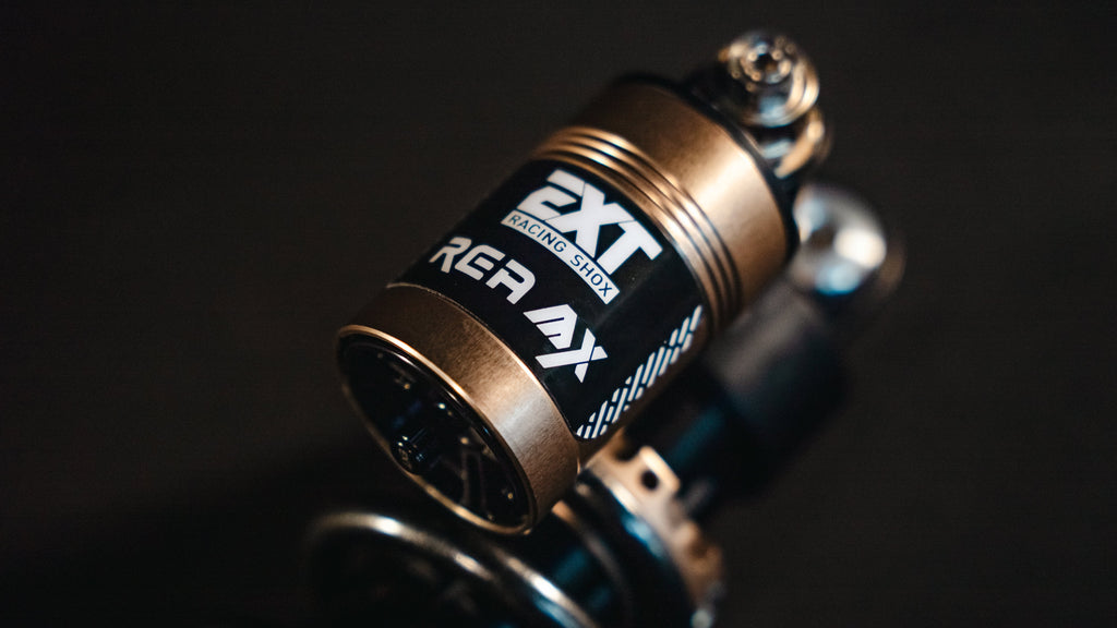 Modded Moto Co EXT REA MX Shock – Ultra Bee, high-performance motorcycle shock absorber with adjustable features visible in the image.