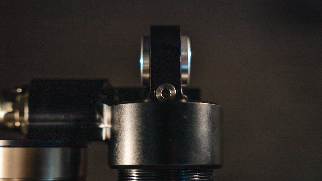 Modded Moto Co EXT REA MX Shock – Ultra Bee, a high-performance motorcycle shock absorber with visible coil spring and mounting components.