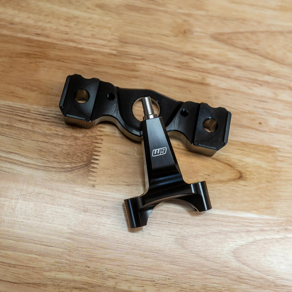 Warp 9 Surron Ultra Bee stabilizer mount with frame post for cockpit and controls by Modded Moto Co, shown on a motorcycle.