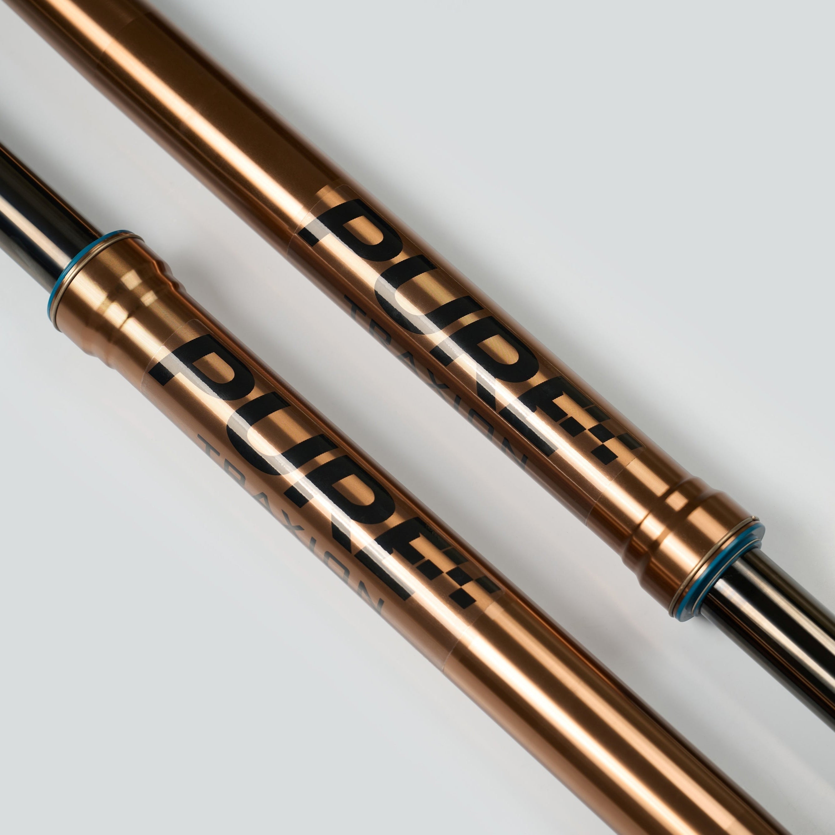 Pure Racing Surron Ultra and Talaria Komodo suspension forks by Modded Moto Co, shown on a motorcycle in this image.