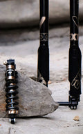 Modded Moto Co EXT Ferro Arma MX suspension hardware set, featuring durable components for motorcycle suspension systems.