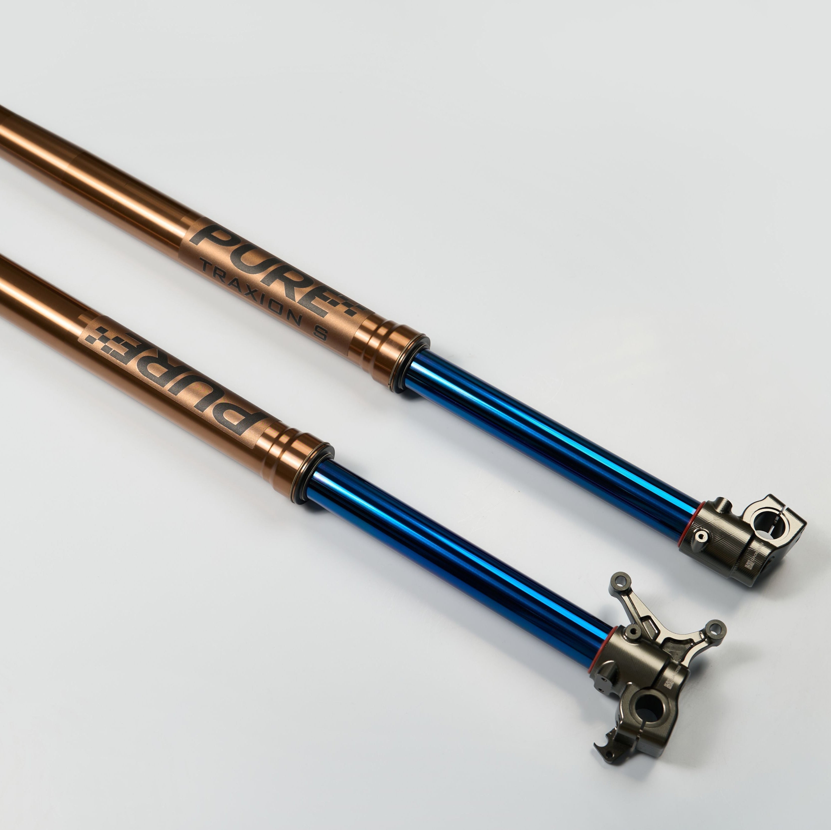 Modded Moto Co Pure Racing Surron Ultra/Talaria Komodo titanium fork suspension with lowers, showcasing durable and lightweight design.