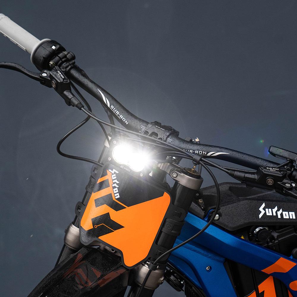 FR SPORT Baja Designs Sur-Ron/Talaria S2 Pro Headlight Conversion Kit 448155 installed on a motorcycle, showing the headlight assembly.