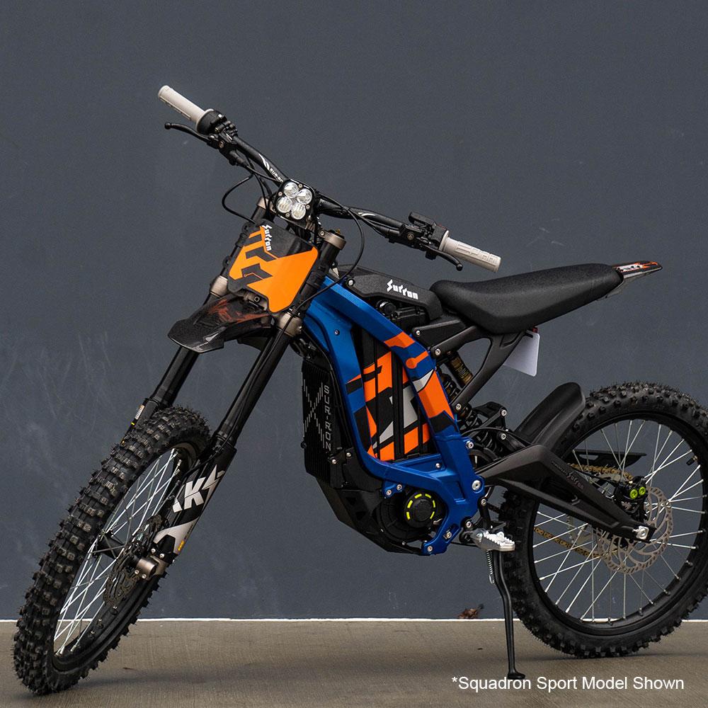 FR SPORT Baja Designs Sur-Ron/Talaria Squadron Pro Headlight Conversion Kit installed on a Sur-Ron electric bike, showing the bright LED headlight.