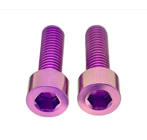 Pair of DevMoto All Emoto Throttle Titanium Bolts set, showcasing sleek metallic finish and precise threading for motorcycle throttle control.