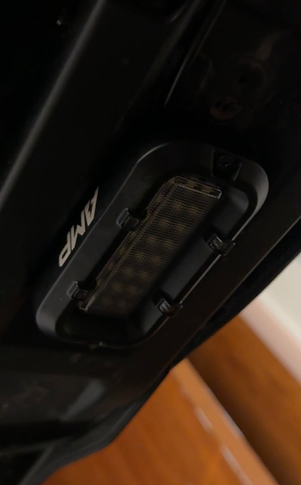 Amp Motion Battery Power Baja with Rocklight, rugged off-road vehicle featuring a powerful battery and integrated rocklights.