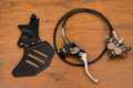 79mods Rear Ultra Bee Brake kit for bikes, showing brake caliper, rotor, and mounting hardware in a detailed close-up image.