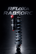 Modded Moto Co RFloXa RAB50RC reservoir rear shock for motorcycle, showing the shock absorber with reservoir and mounting components.
