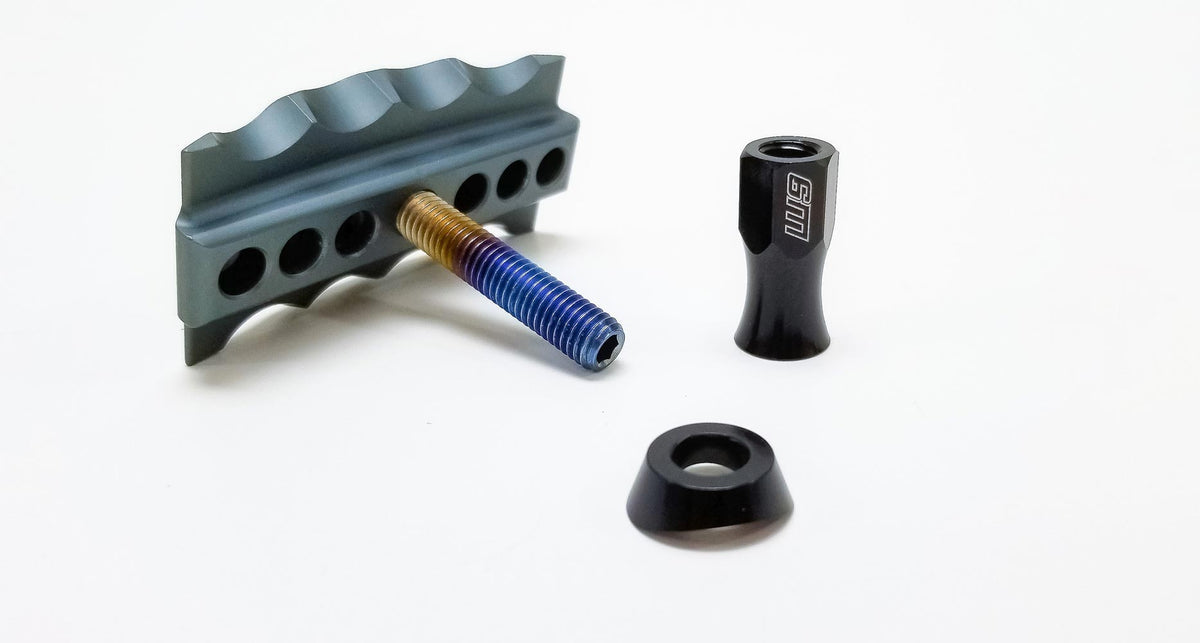 Modded Moto Co Warp 9 Titanium Pro Rim Locks accessory with durable titanium construction and secure locking mechanism.
