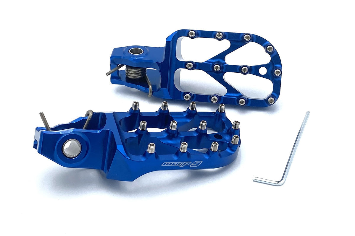 Modded Moto Co Warp 9 Stark Varg Elite foot pegs with metal construction and textured grip surface for motorcycle riding stability.