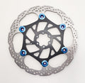Rear Warp 9 brake rotor by Modded Moto Co, showcasing a high-performance motorcycle brake rotor with vented design.