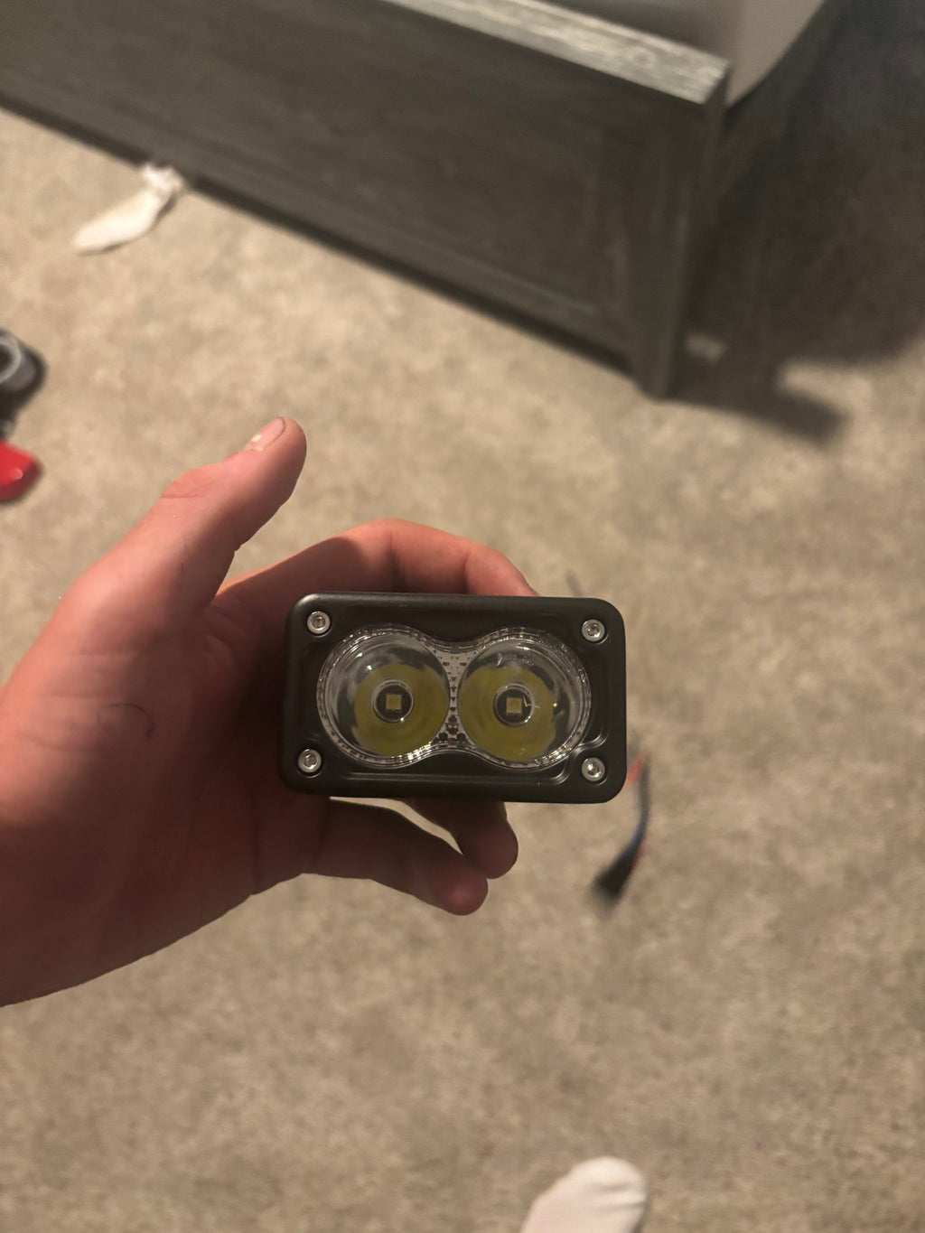 79Bike Baja Light by 79mods mounted on a bike handlebar, showcasing its compact design and bright LED illumination.
