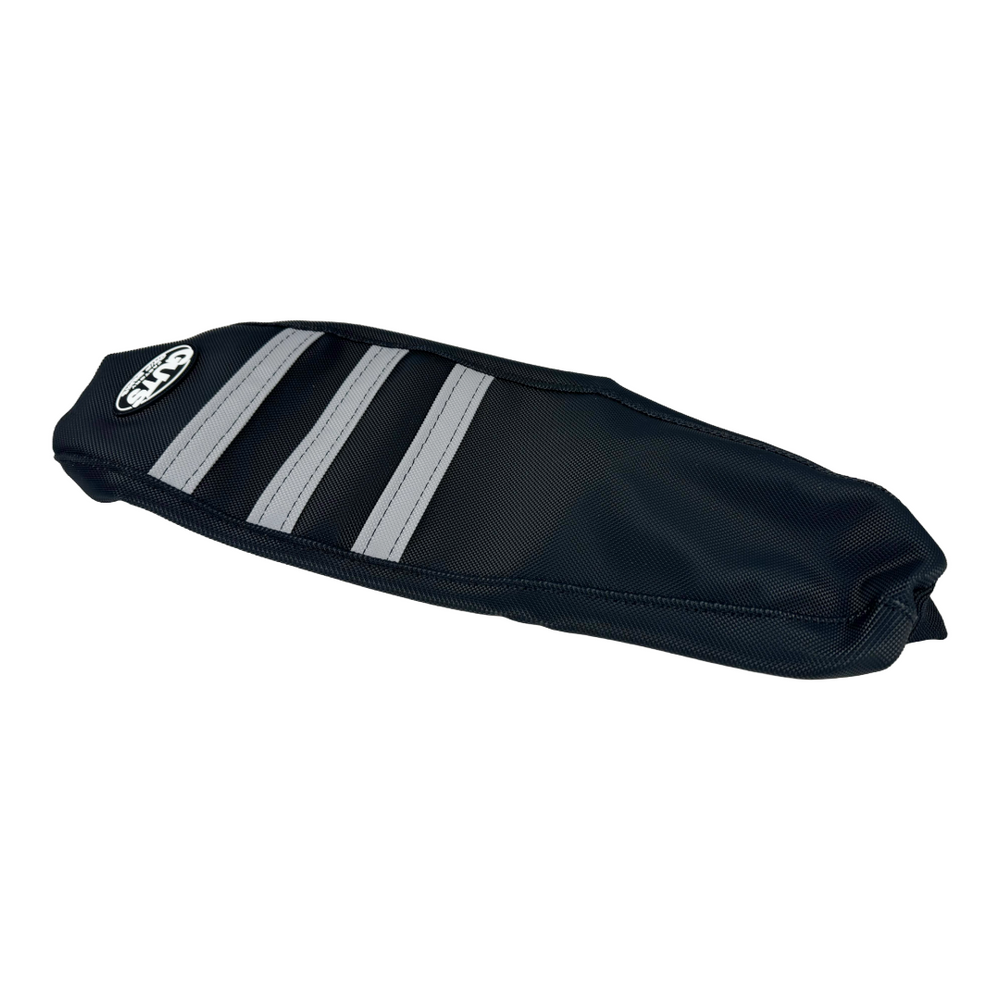 Modded Moto Co Guts Seat Cover for E-Ride Pro motorcycle, close-up view showing durable fabric and installation details.