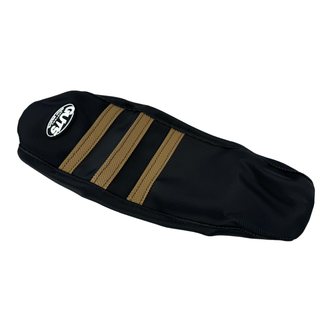 Modded Moto Co Guts Seat Cover for Sur-Ron Ultra Bee electric bike, durable black seat cover with textured surface.