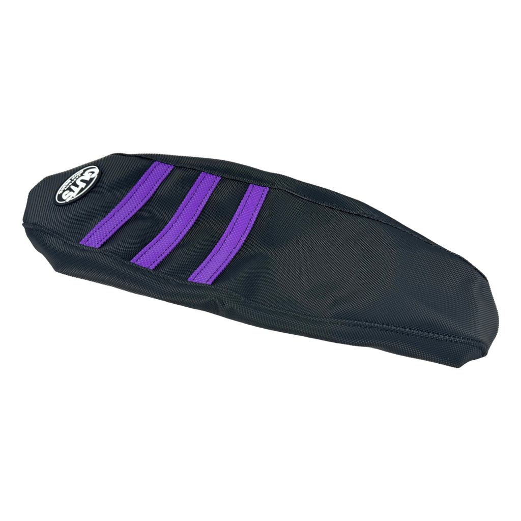 Modded Moto Co Guts Seat Cover for E-Ride Pro motorcycle, close-up view of durable, textured seat cover material.
