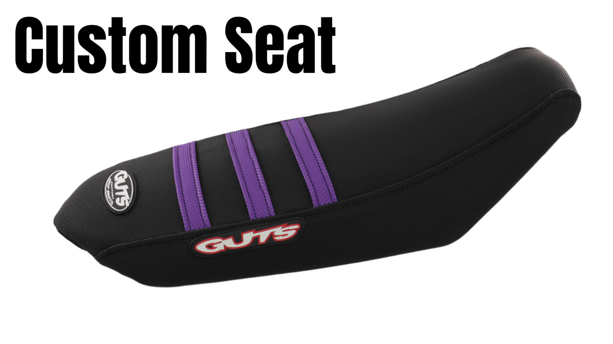 Guts Custom Complete Seat Cover by Modded Moto Co, showing a close-up of the durable, custom-designed motorcycle seat cover.