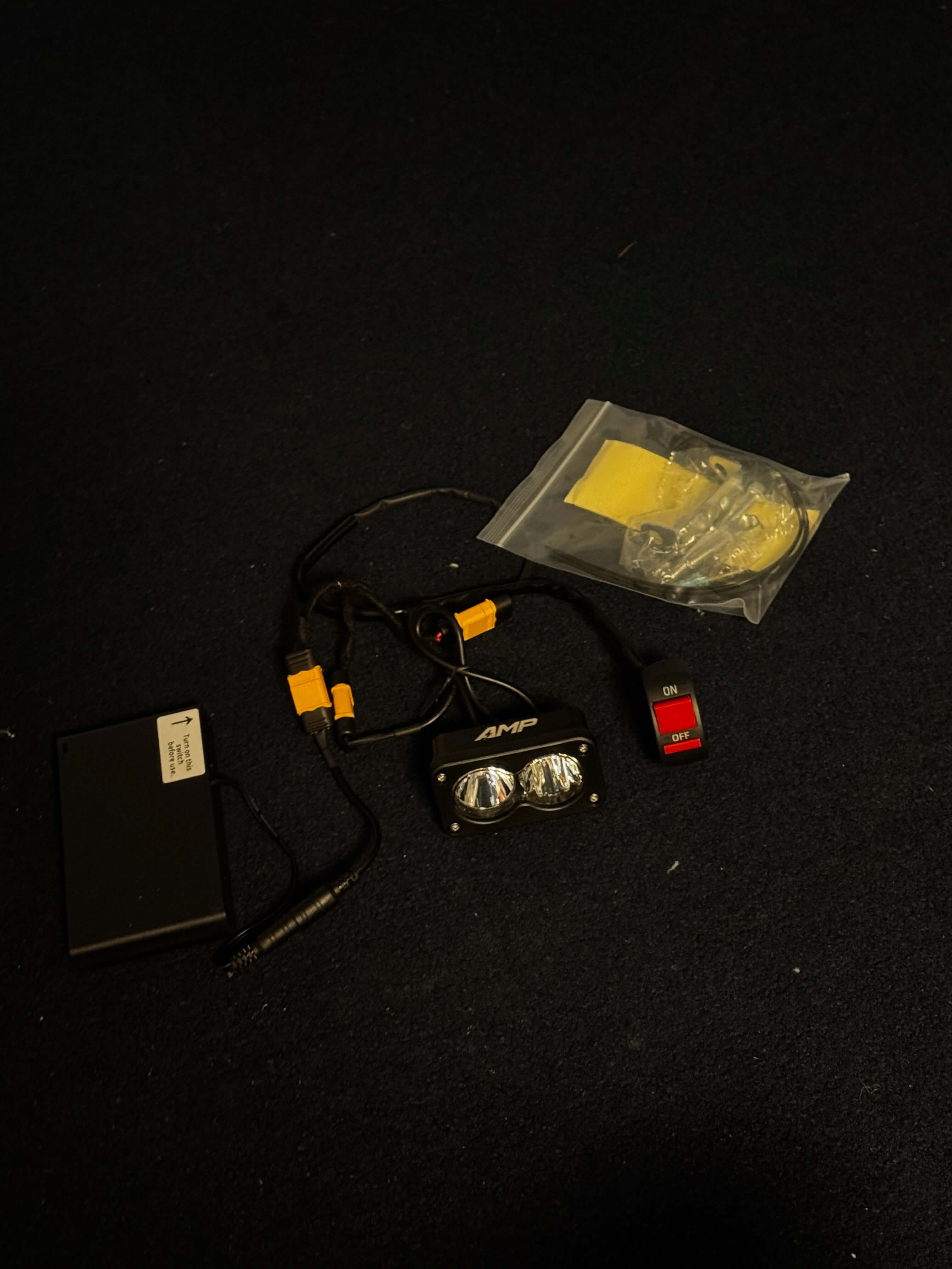 Amp Motion Battery Power Baja Lights with switches, featuring durable design and bright LED illumination for off-road use.