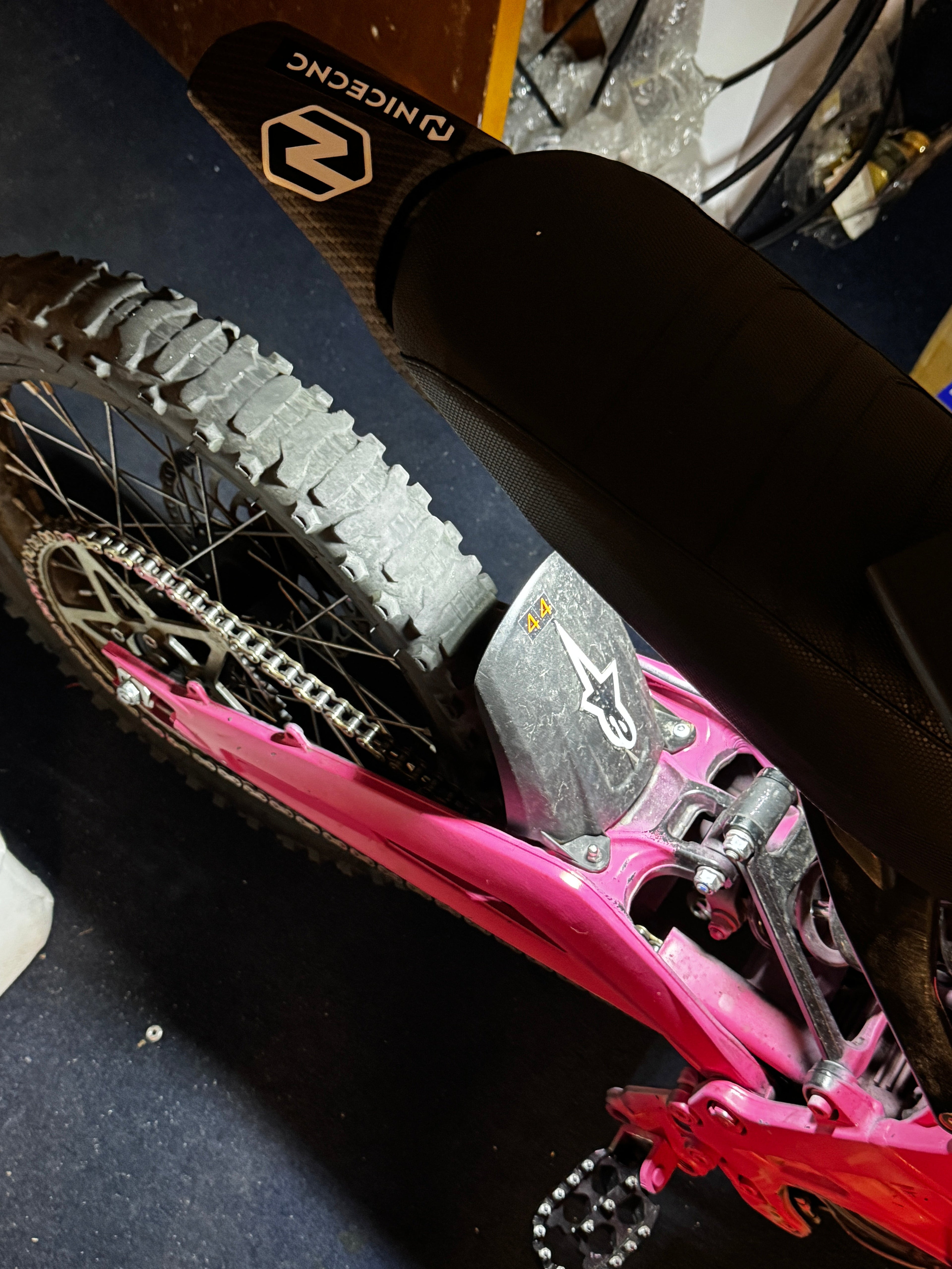 Amp Motion Battery Power Baja with Rocklight, rugged off-road vehicle featuring powerful battery and illuminated rocklight system.