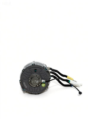Modded Moto Co Ventus 48 KW Ultra Bee motor, industrial electric motor with sturdy build and cooling fins, on a plain background.
