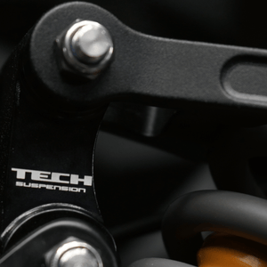 Modded Moto Co TECH ER30 283mm rear shock absorber, high-performance motorcycle shock with coil spring and mounting hardware.