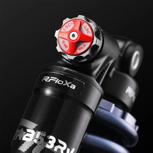 Modded Moto Co RFloXa RAB50RC reservoir rear shock for motorbikes, showing the shock absorber with reservoir and mounting hardware.