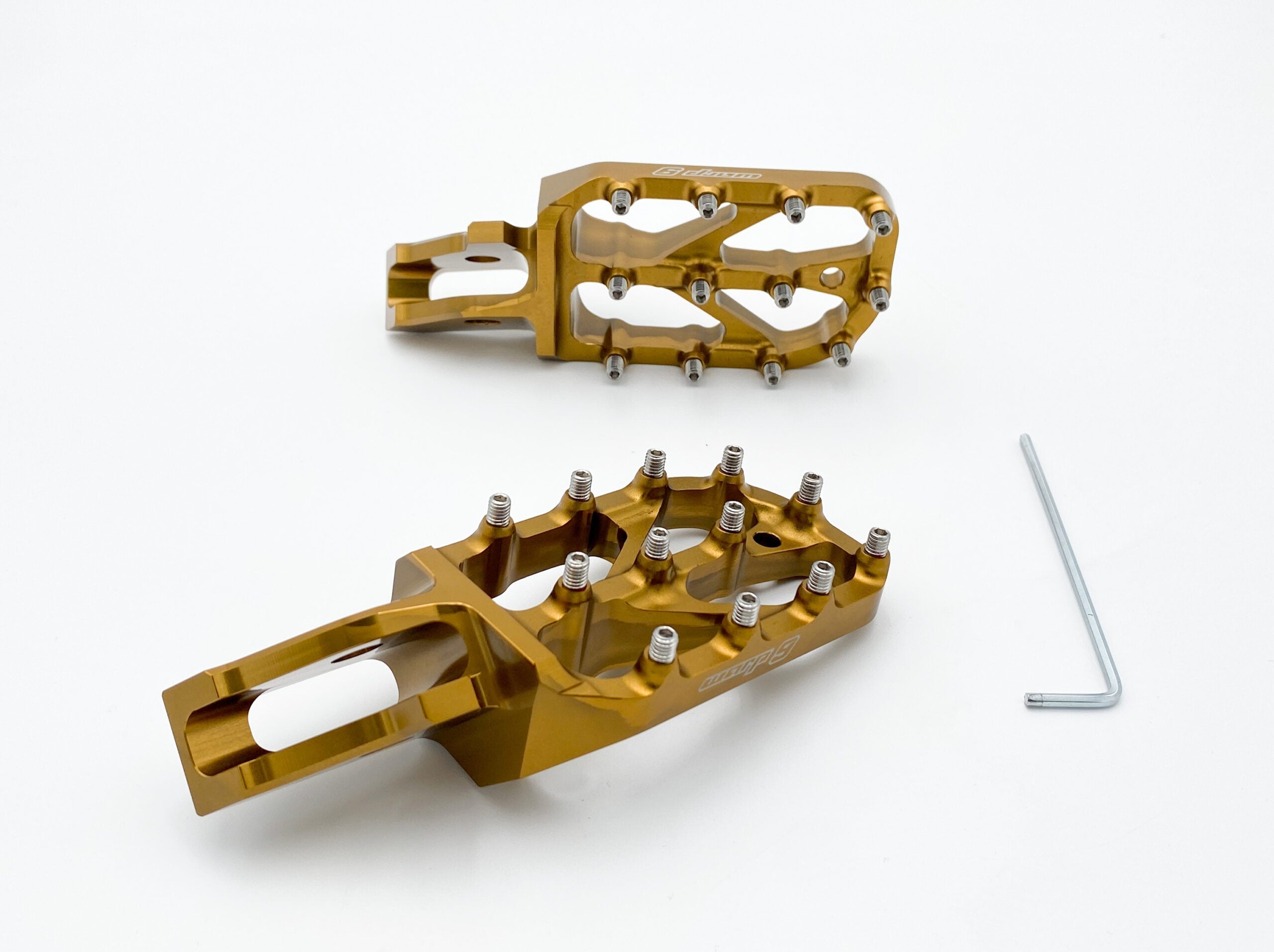 Modded Moto Co Warp 9 Ultra Bee Elite foot pegs for motorcycles, showcasing durable metal construction and textured grip surface.