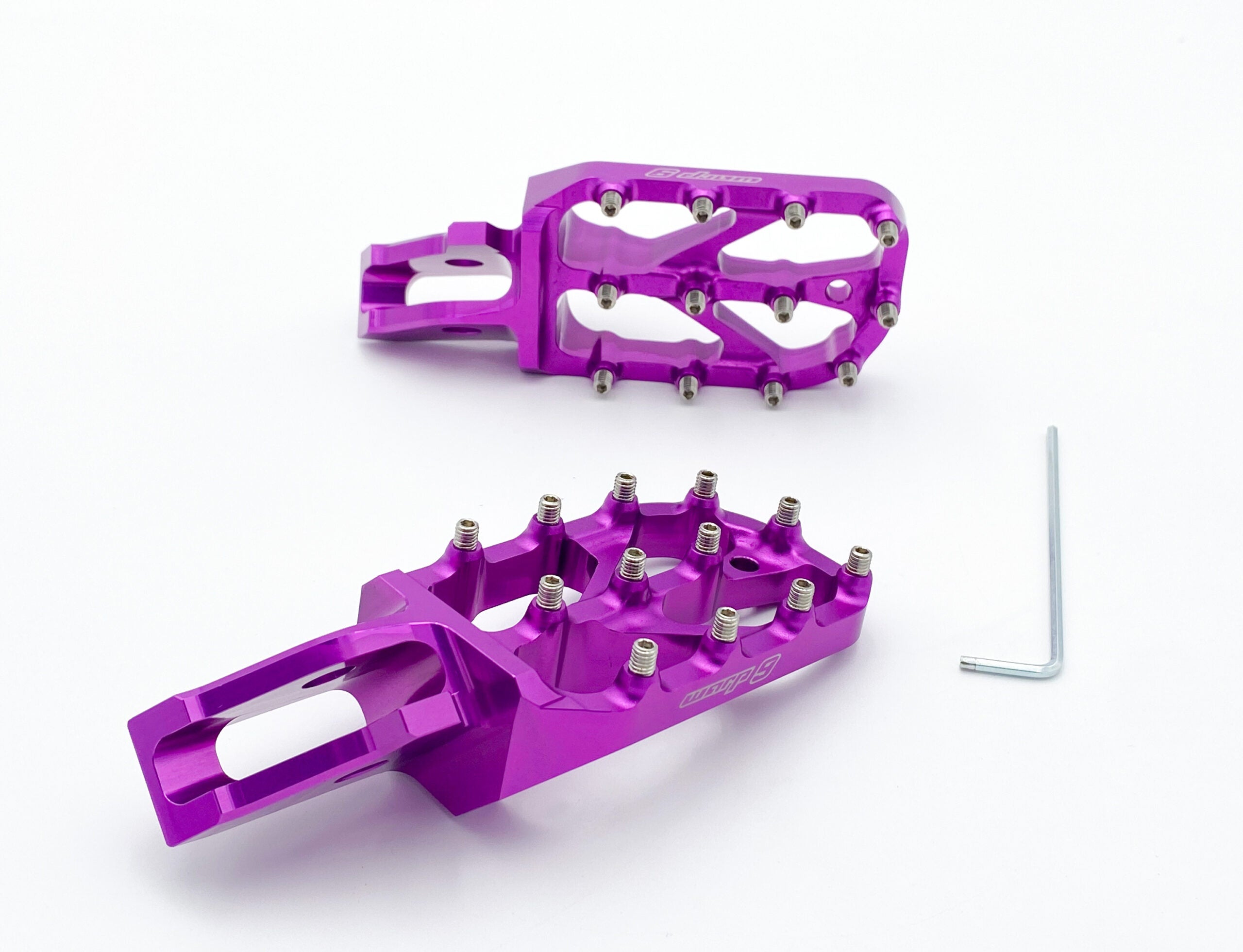 Modded Moto Co Warp 9 Ultra Bee Elite foot pegs for motorcycles, showcasing durable metal design and mounting hardware.