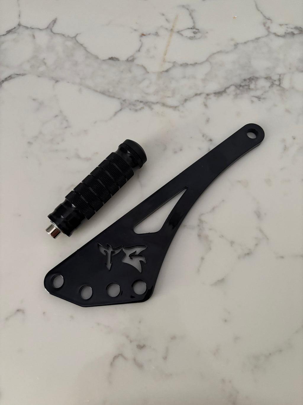Eride Pro Shiftlock by TG Racing, a high-performance gear shifter lock mechanism for enhanced motorcycle security.