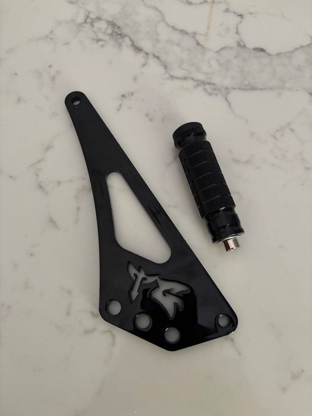TG Racing MX3/4/5 Shiftlock mechanism for motorcycle gear shifters, shown in black with detailed components.