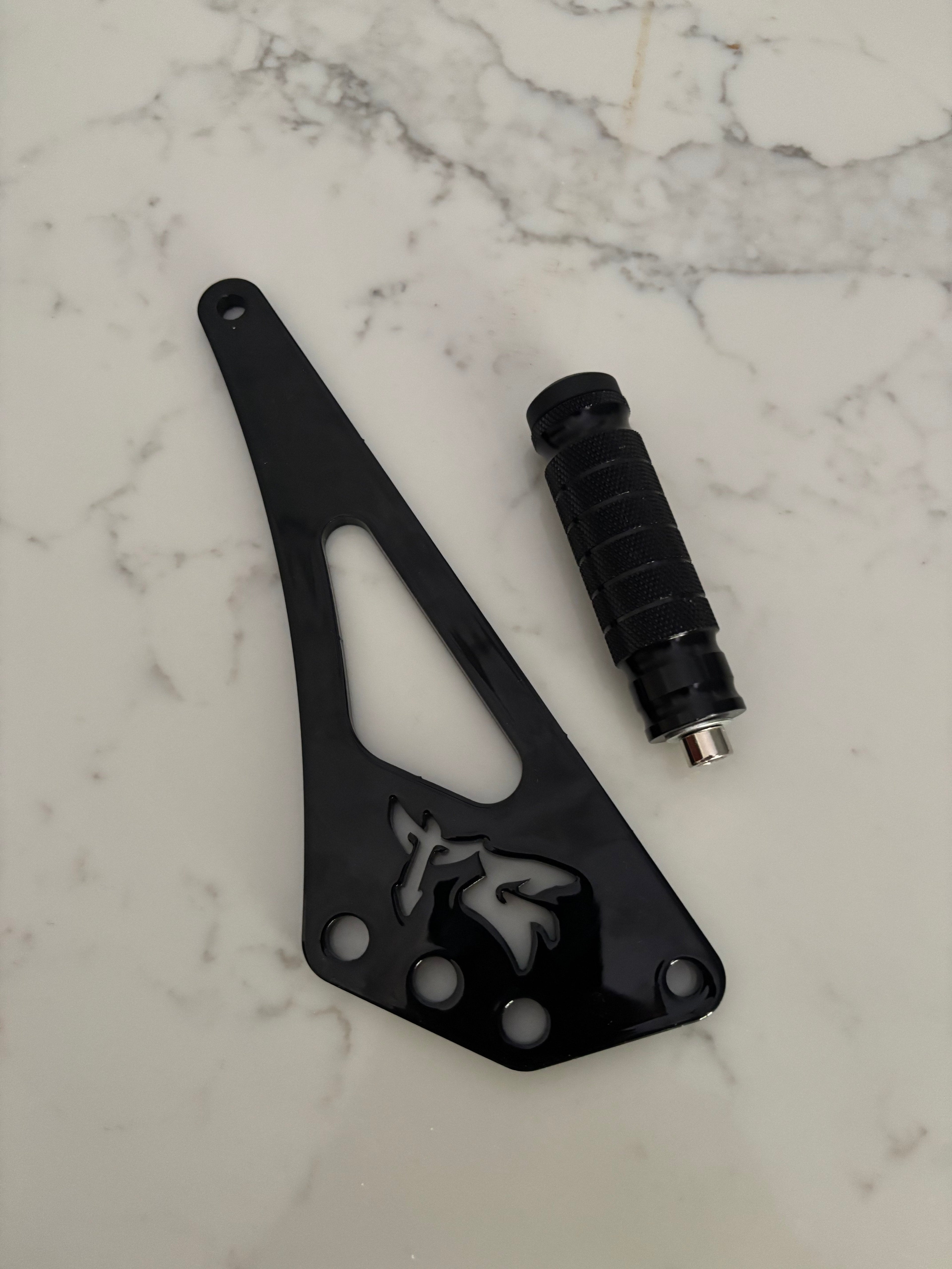 TG Racing MX3/4/5 Shiftlock mechanism for motorcycle gear shifters, shown in black with detailed components.