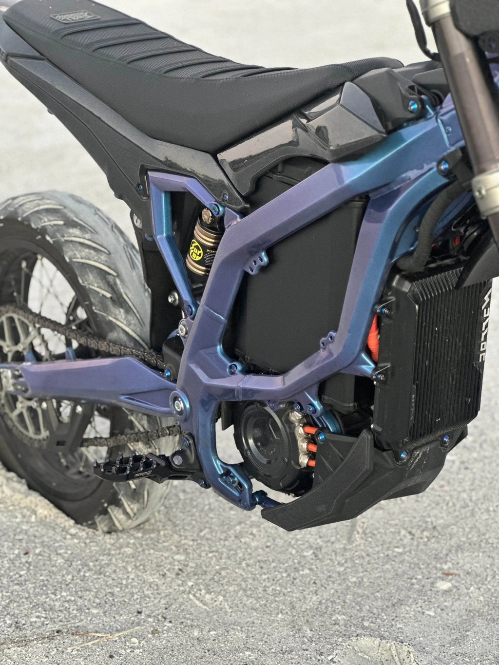 MXwraps 72V e-bike battery vinyl wrap for conversion kit, showcasing stylish protective covering on the battery.