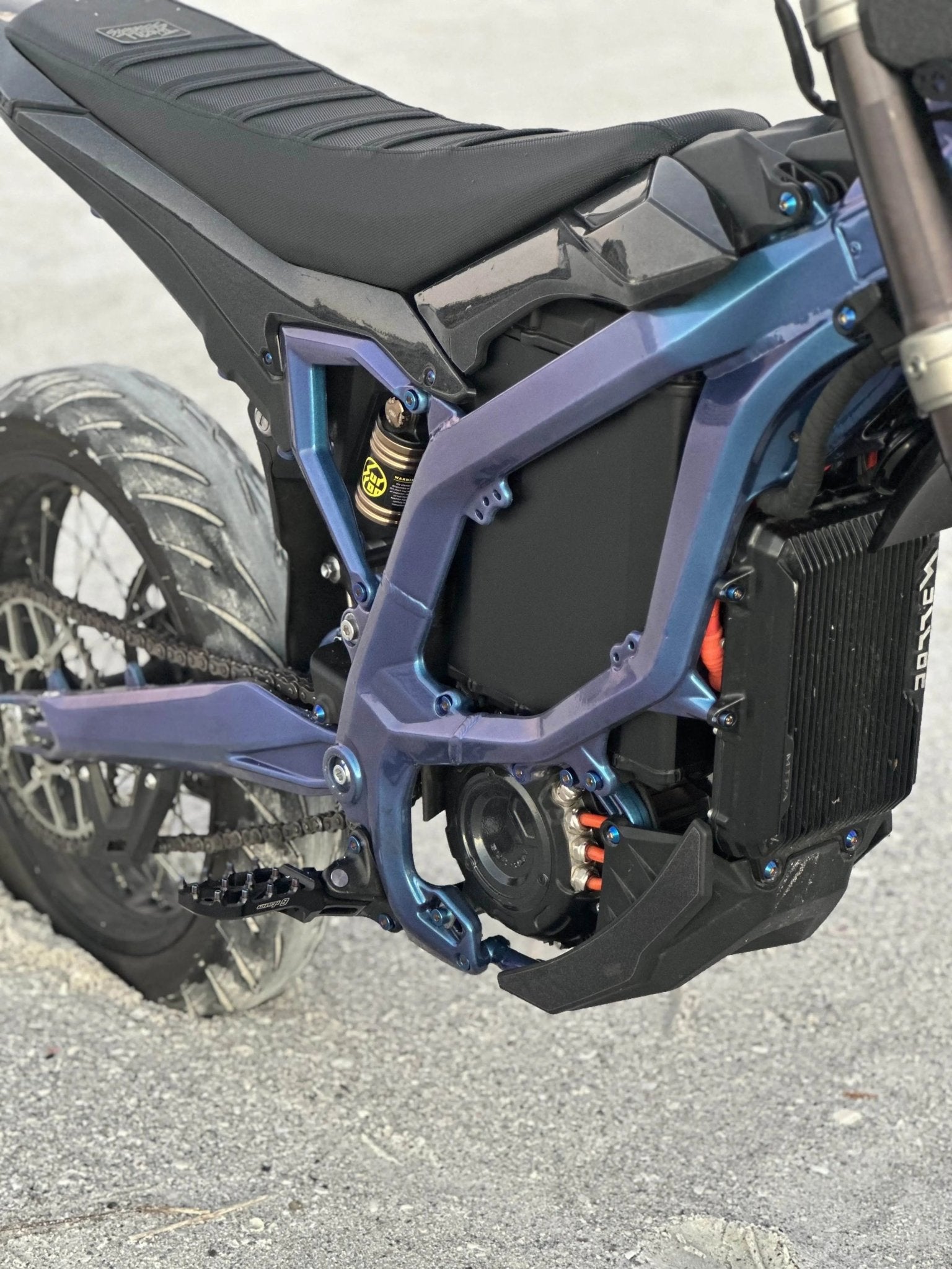 MXwraps 72V e-bike battery vinyl wrap for conversion kit, showcasing stylish protective covering on the battery.