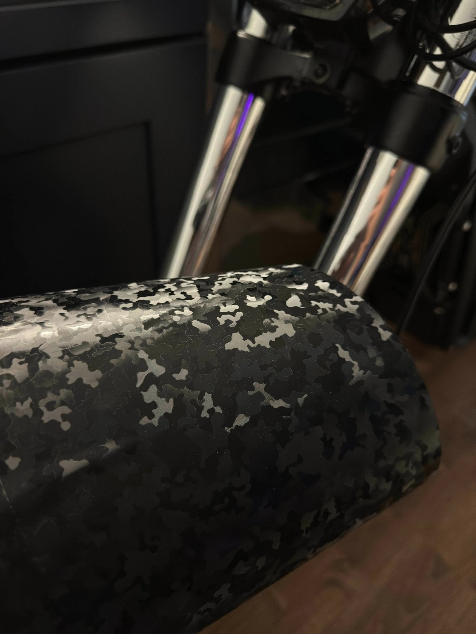 MXwraps E-bike fork vinyl wrap kit installed on bicycle fork, showcasing protective and decorative bike component covering.