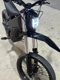MXwraps E-bike fork vinyl wrap kit showing gray and black protective wrap applied to bicycle fork for custom styling.