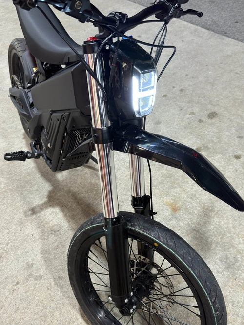 MXwraps E-bike fork vinyl wrap kit showing gray and black protective wrap applied to bicycle fork for custom styling.
